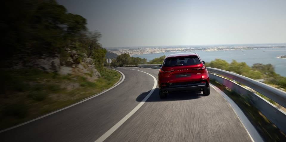 Mazda CX-5 driving on coastal road